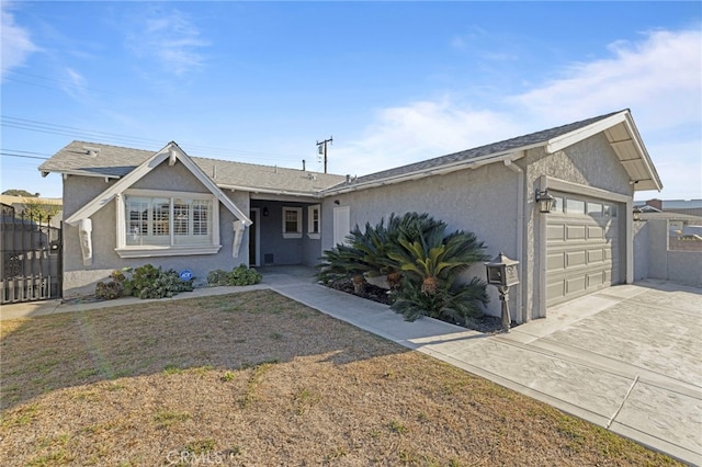 ranch-style home with a front lawn and a garage