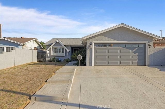 single story home featuring a front yard and a garage