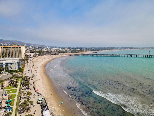 property view of water featuring a city view and a beach view