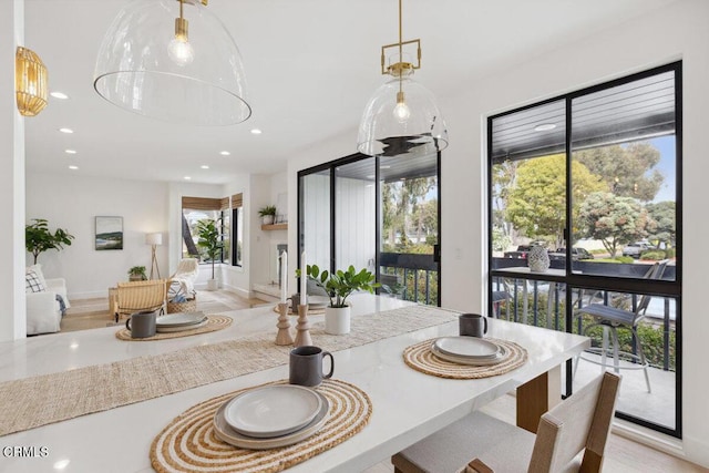 dining room with recessed lighting