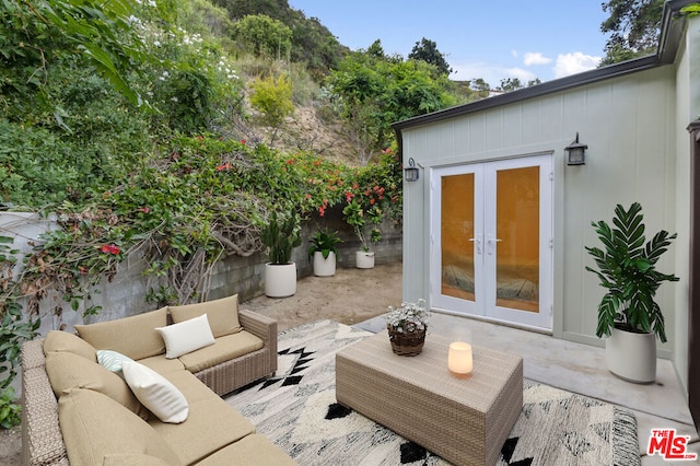 view of patio featuring an outdoor hangout area and french doors