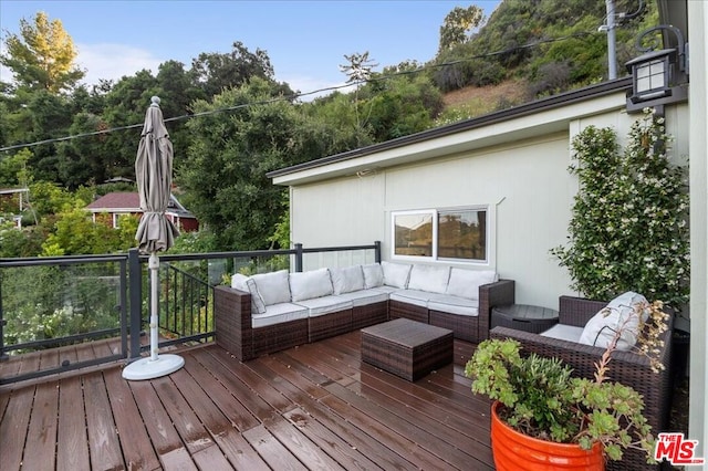 deck featuring an outdoor hangout area