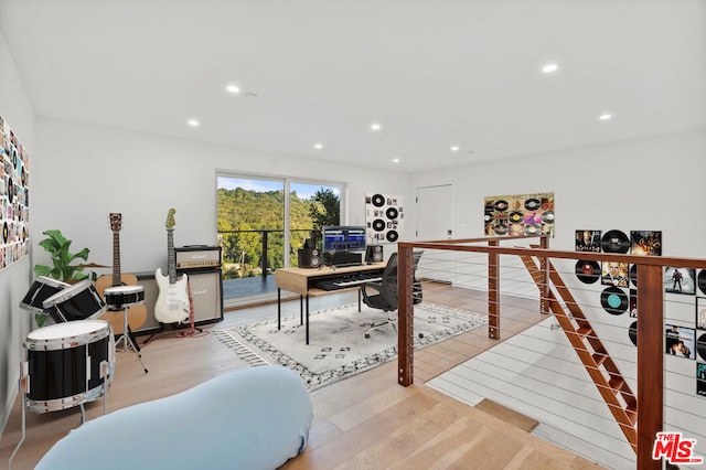 office space with hardwood / wood-style floors