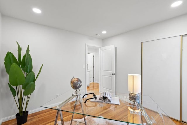 office area with hardwood / wood-style flooring