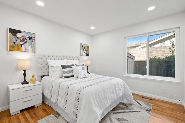 bedroom with light wood-type flooring