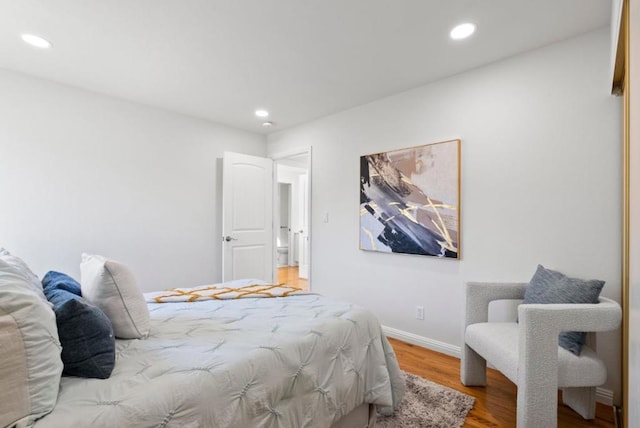 bedroom featuring light hardwood / wood-style floors