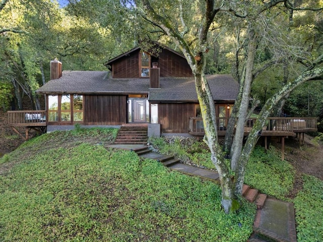 view of front of property featuring a deck