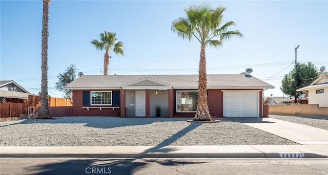 single story home featuring a garage