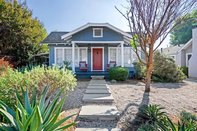 bungalow-style house featuring covered porch