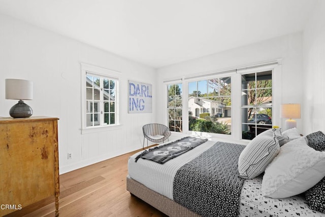 bedroom with hardwood / wood-style flooring