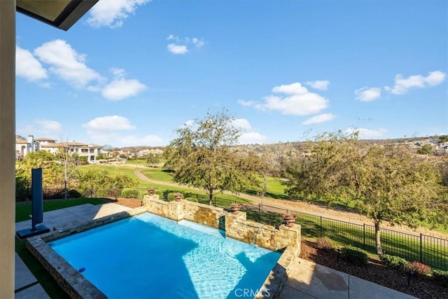 view of pool featuring a patio area