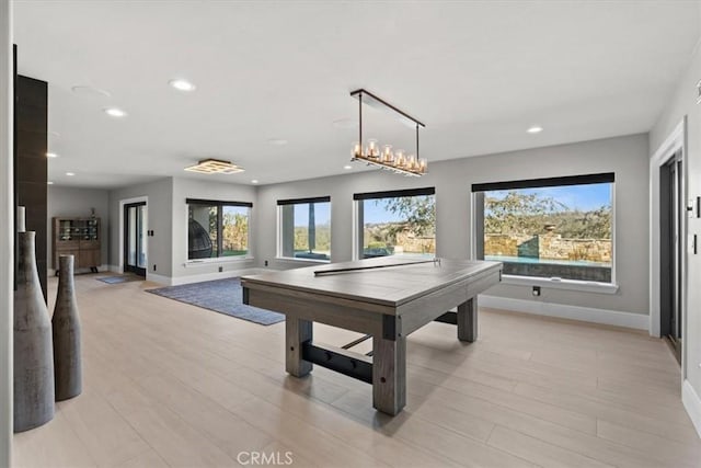 recreation room featuring pool table and light hardwood / wood-style floors