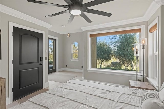 bedroom with ceiling fan, access to exterior, and crown molding