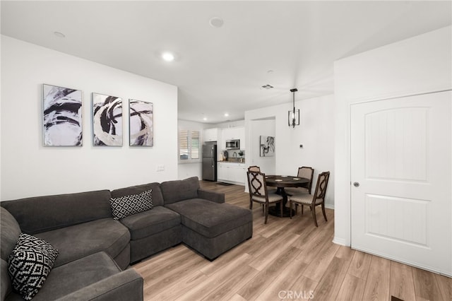 living room featuring light hardwood / wood-style floors