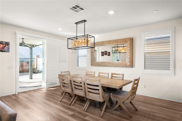 dining area featuring hardwood / wood-style flooring