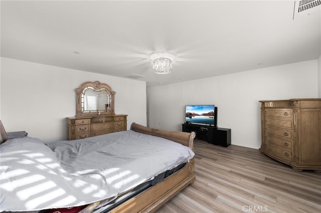 bedroom featuring light wood-type flooring