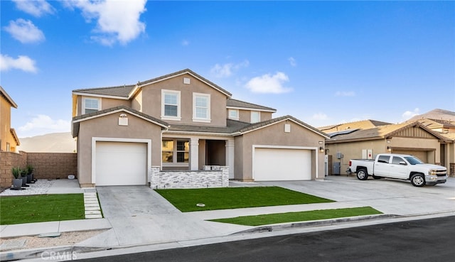 view of front of property with a garage