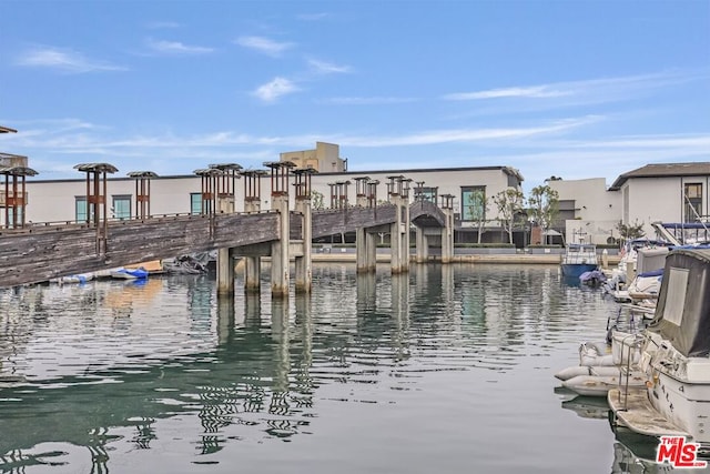 view of dock with a water view