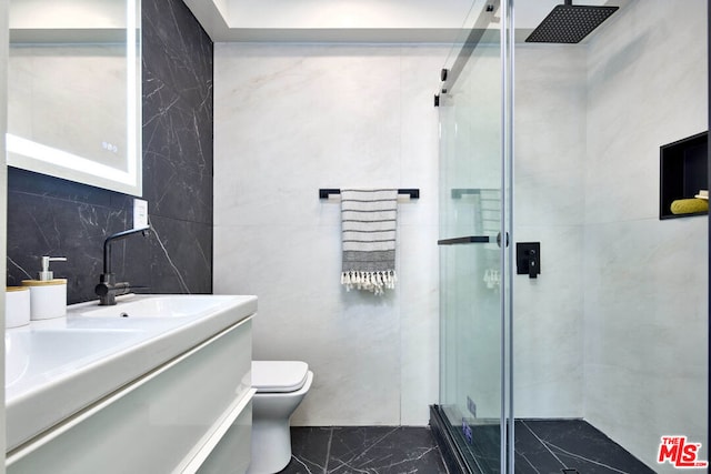 bathroom with a shower with shower door, tile walls, and toilet