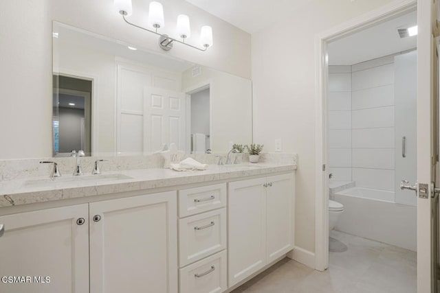 full bathroom with toilet, tile patterned floors, tub / shower combination, and vanity