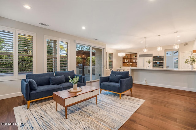 living room with hardwood / wood-style floors