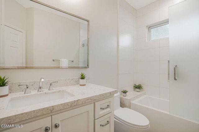 full bathroom with toilet, tiled shower / bath combo, and vanity