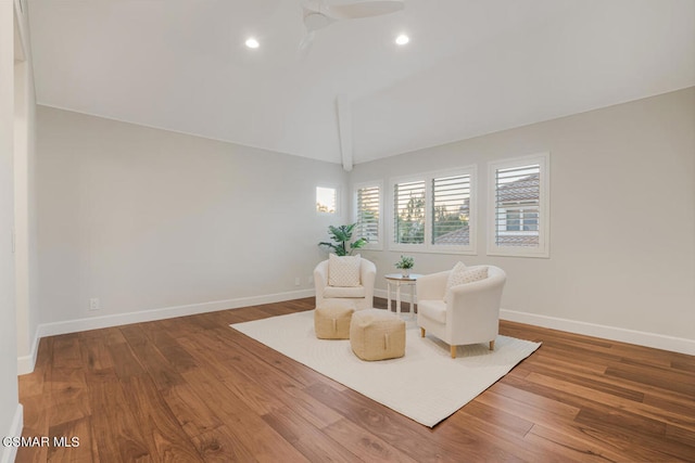 sitting room featuring ceiling fan, lofted ceiling, and hardwood / wood-style floors