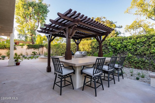 view of patio featuring exterior bar, a pergola, and area for grilling