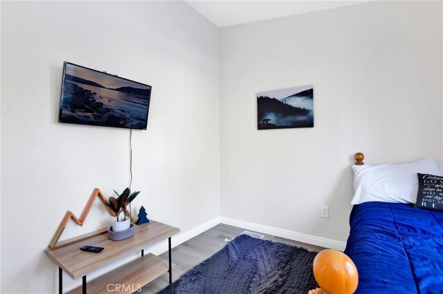 bedroom featuring hardwood / wood-style floors