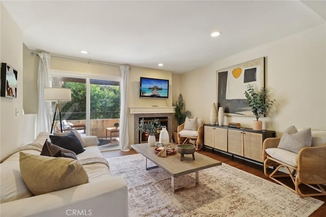 living room with dark hardwood / wood-style floors