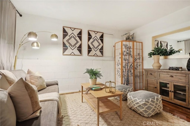 living room with dark hardwood / wood-style floors