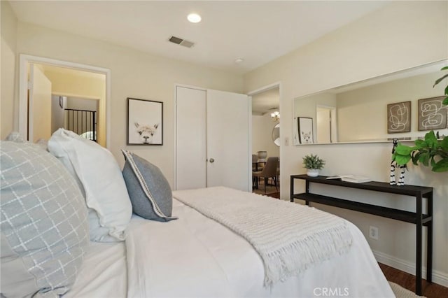 bedroom with wood-type flooring