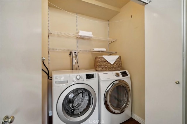 laundry area featuring washer and clothes dryer