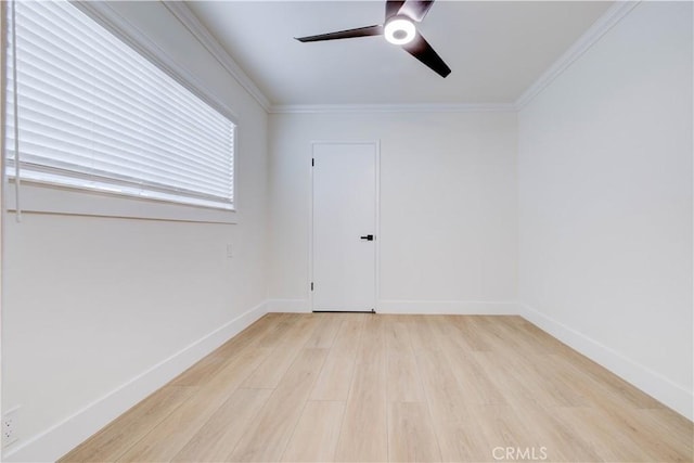 unfurnished room with ceiling fan, crown molding, and light hardwood / wood-style floors