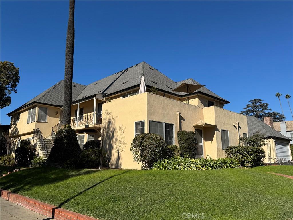 view of home's exterior with a yard