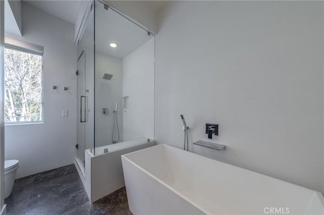 bathroom with toilet and independent shower and bath