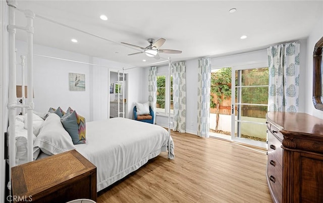 bedroom with ceiling fan, light hardwood / wood-style flooring, and access to outside