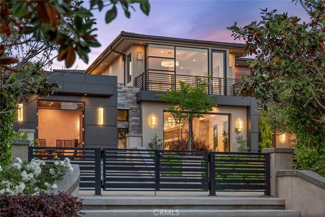 modern home with a balcony