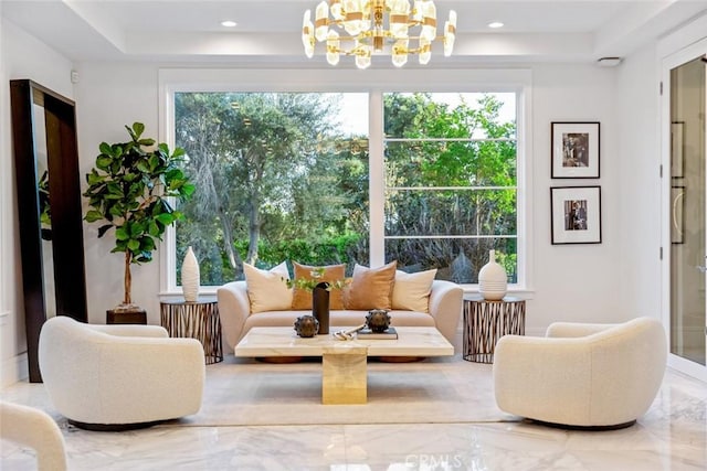 sunroom with a notable chandelier