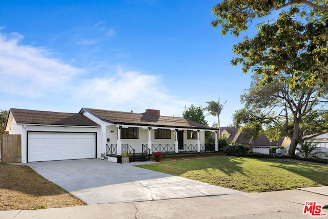 single story home with a garage and a front yard