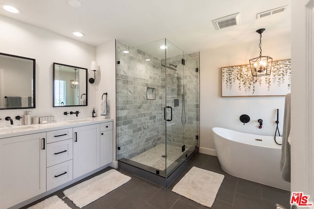 bathroom featuring vanity, tile patterned floors, a chandelier, and shower with separate bathtub