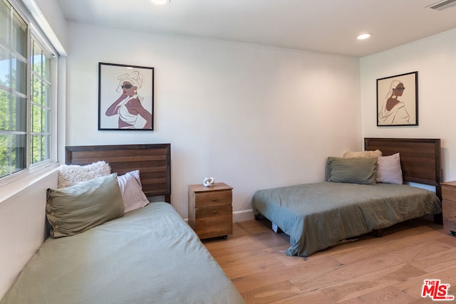 bedroom featuring light hardwood / wood-style floors