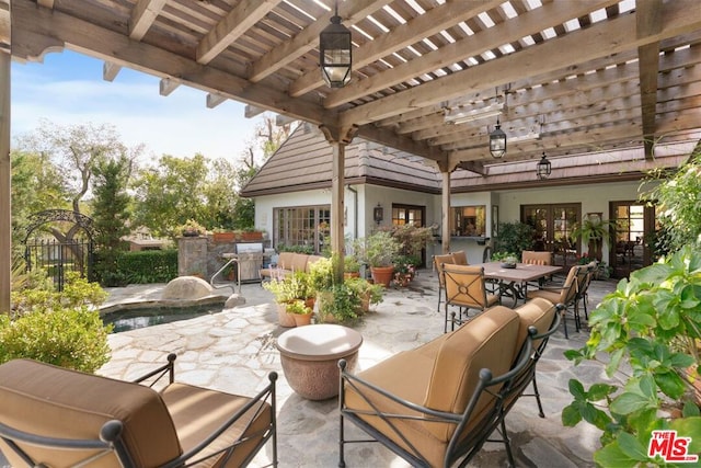 view of patio / terrace featuring a pergola