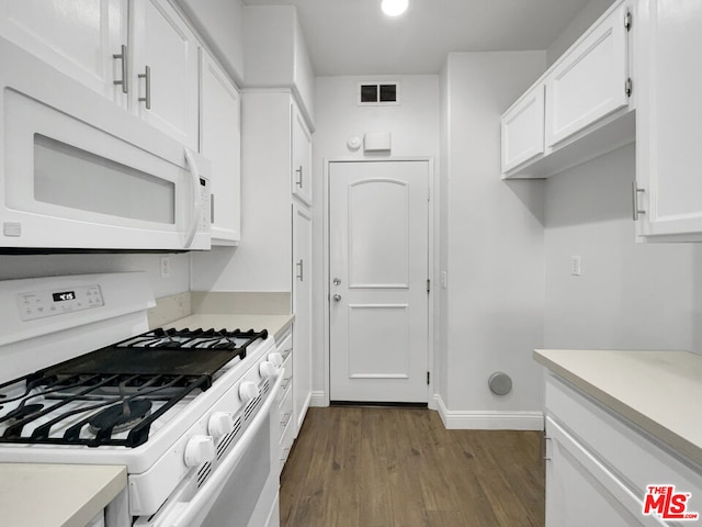 kitchen featuring white cabinetry, white appliances, and dark hardwood / wood-style flooring