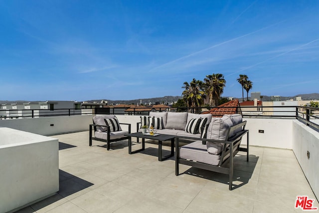 view of patio / terrace with outdoor lounge area and a balcony