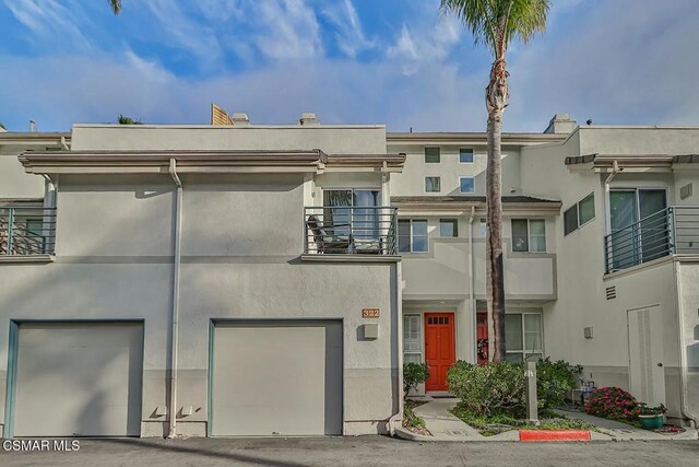 view of property with a garage