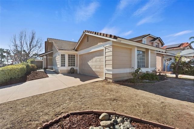 view of side of property featuring a garage