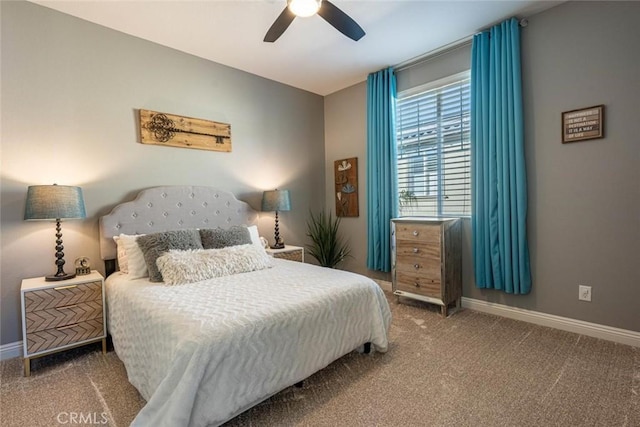 bedroom featuring ceiling fan and carpet flooring