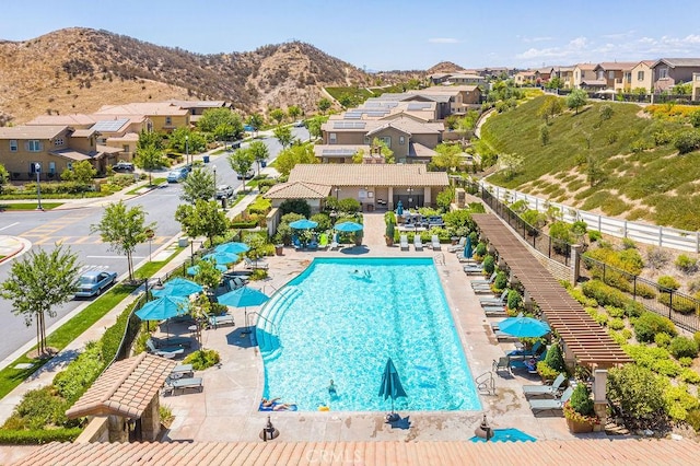 view of pool with a mountain view