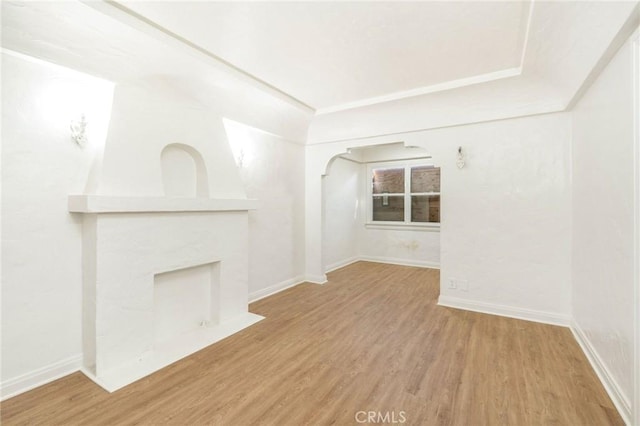 unfurnished living room featuring light hardwood / wood-style floors